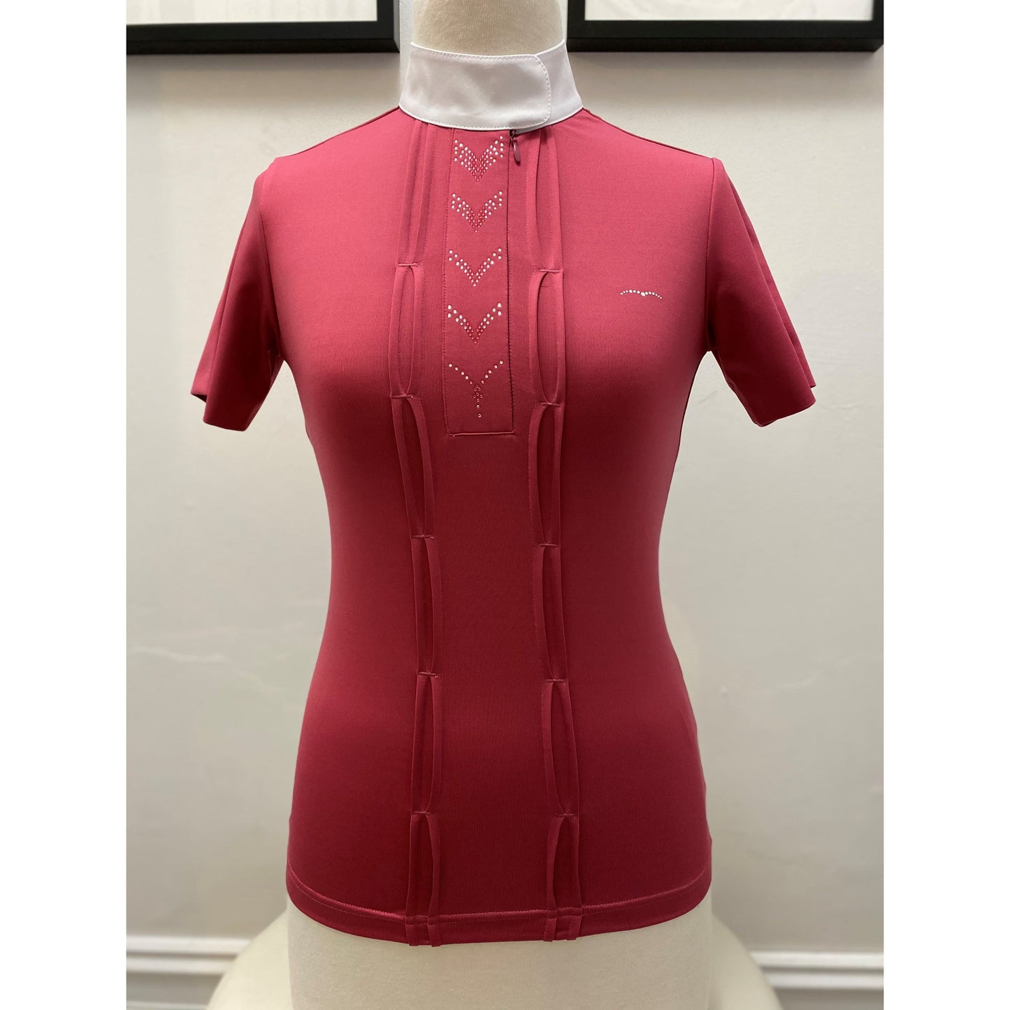 Animo brand short-sleeved pink equestrian show shirt on mannequin.