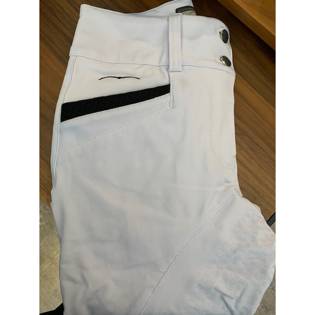 Animo brand white equestrian breeches with black details folded.