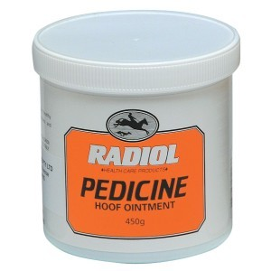 A white plastic container with orange label for "Radiol PEDICINE Hoof Ointment" for horse hoof care, 450g size.