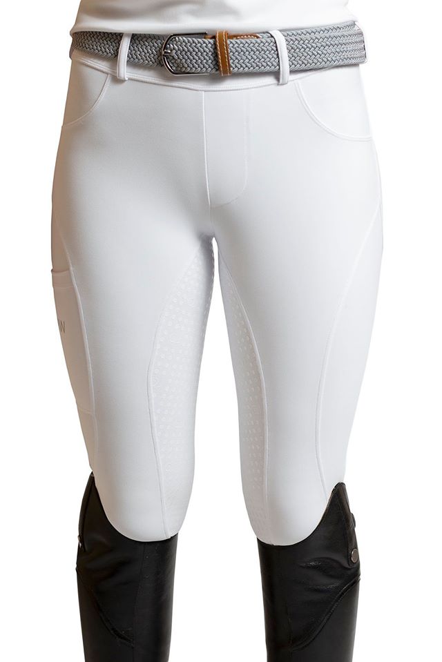 White horse riding tights with knee patches and woven belt displayed.