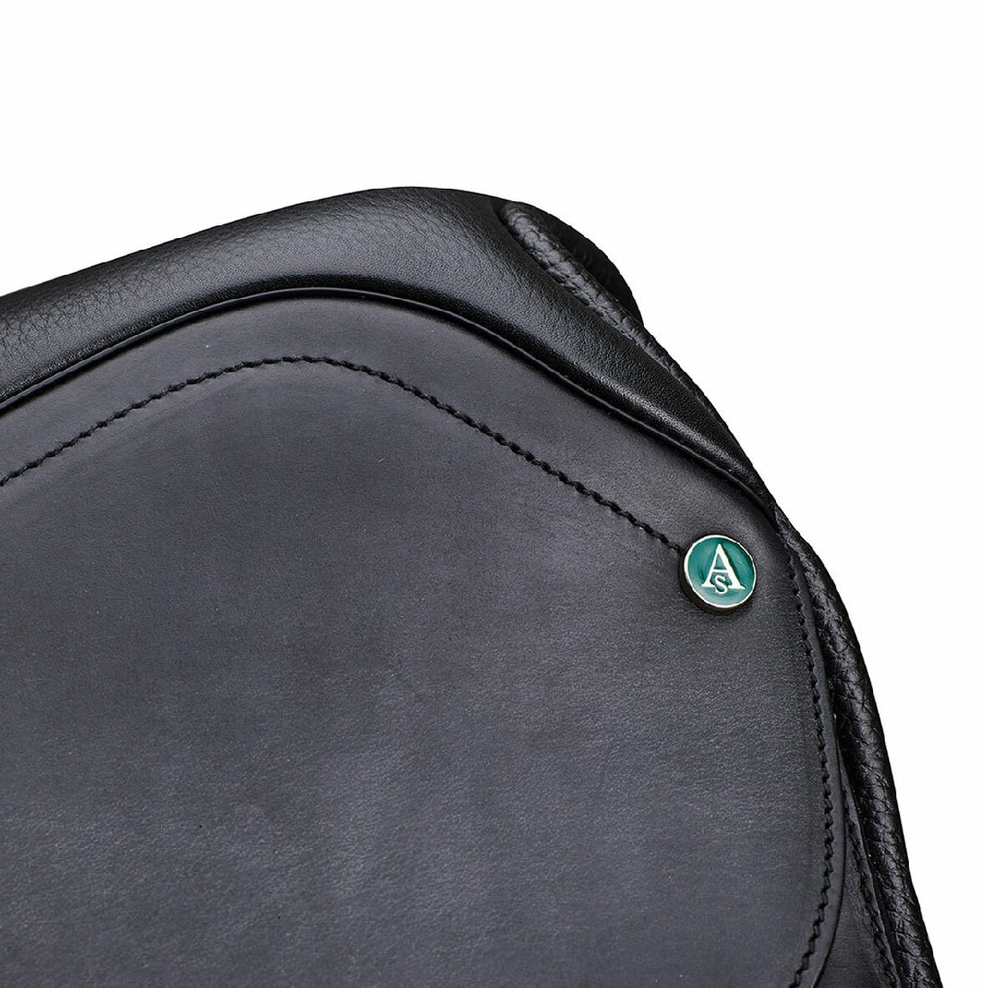 Close-up of Arena Saddles logo on black horse saddle leather.