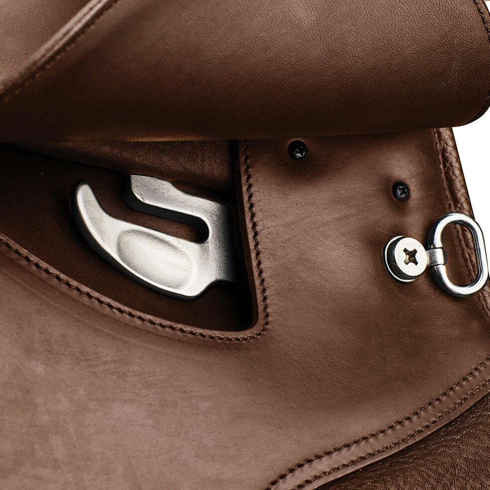 Close-up of Arena Saddles brown leather saddle stirrup detail.