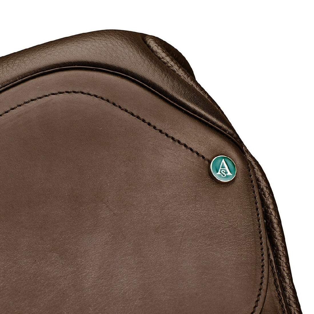 Arena Saddles logo on dark brown leather saddle close-up.