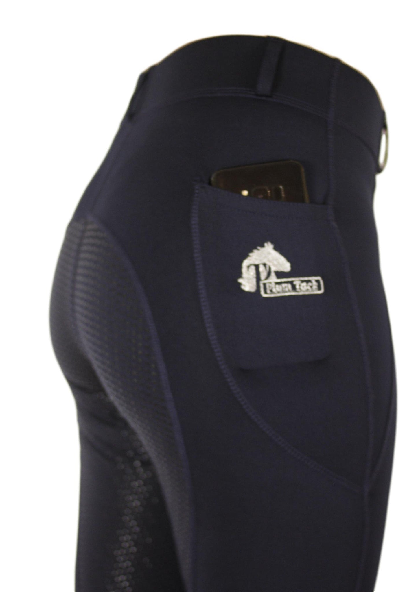 Close-up of navy blue horse riding tights with a phone pocket.