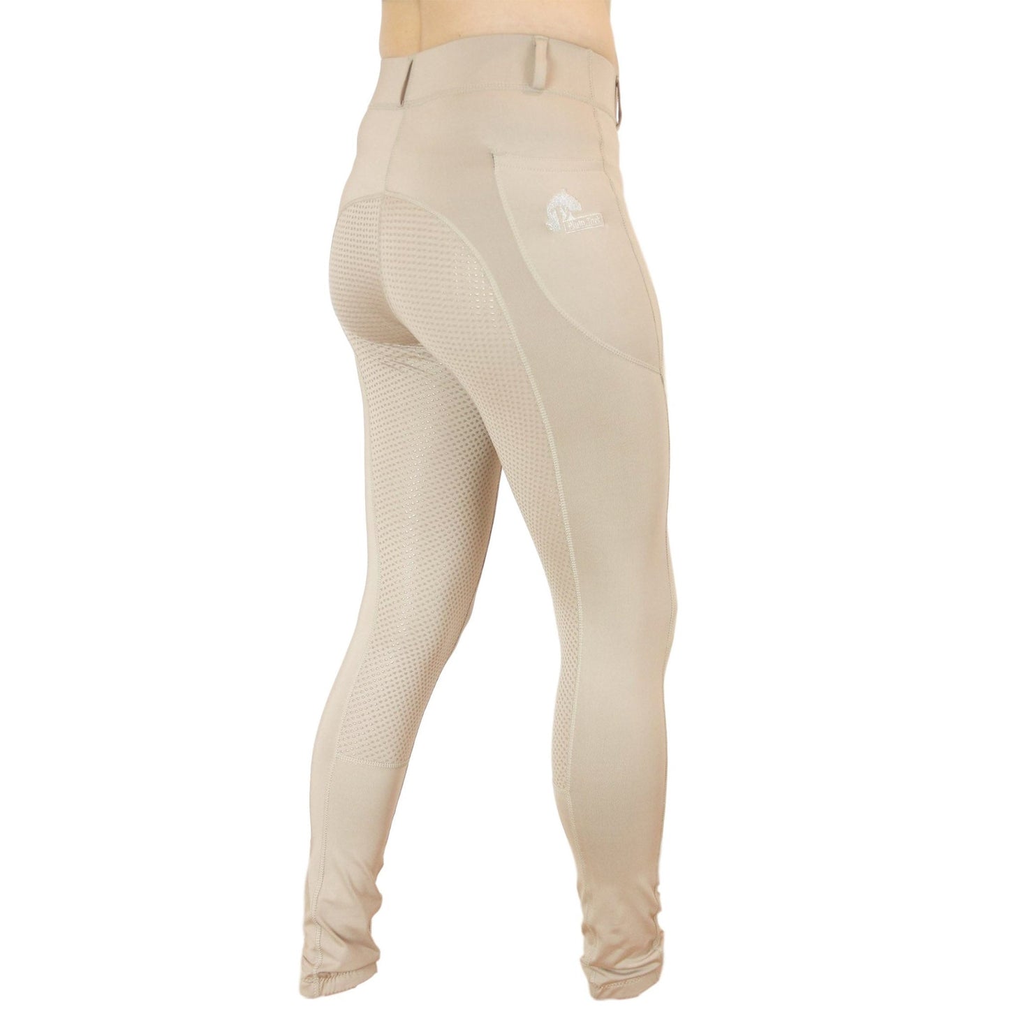 Person wearing beige horse riding tights with mesh panels, no background.