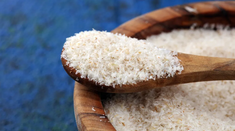 psyllium husk on a wooden spoon