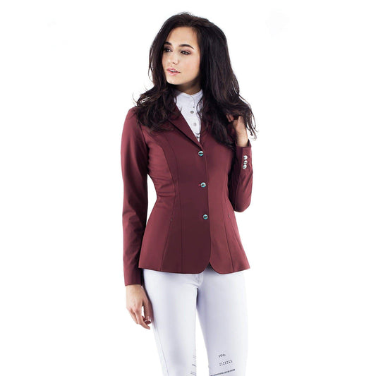 Woman modeling maroon Animo show jacket with white breeches.