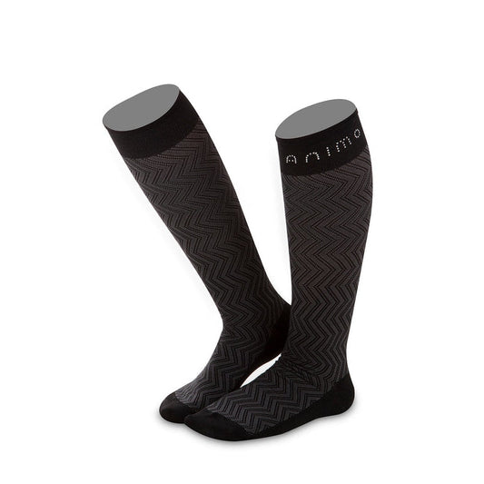 Animo brand black patterned equestrian riding socks on white background.