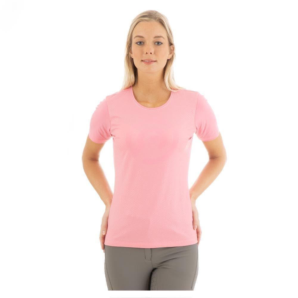 Woman wearing ANKY pink short-sleeved athletic t-shirt.