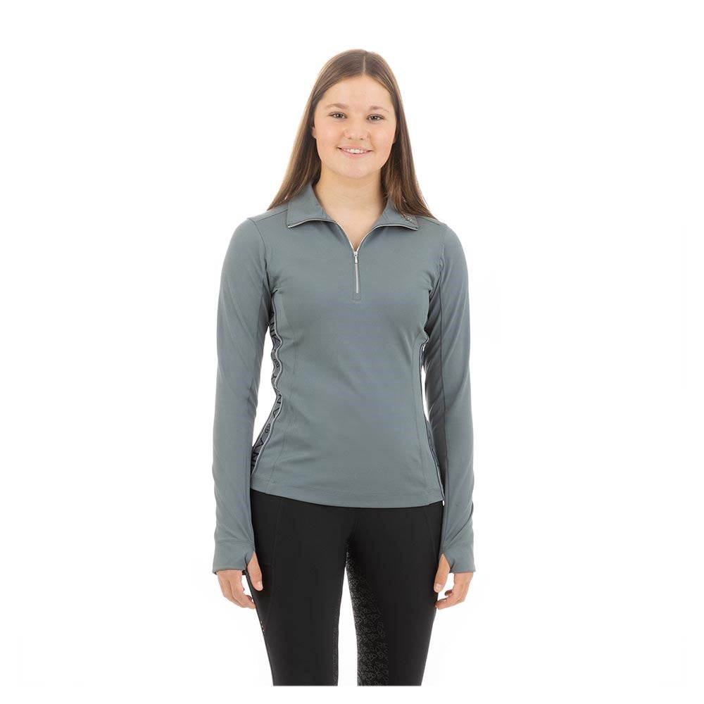 Woman in ANKY zippered gray sports shirt with black pants.