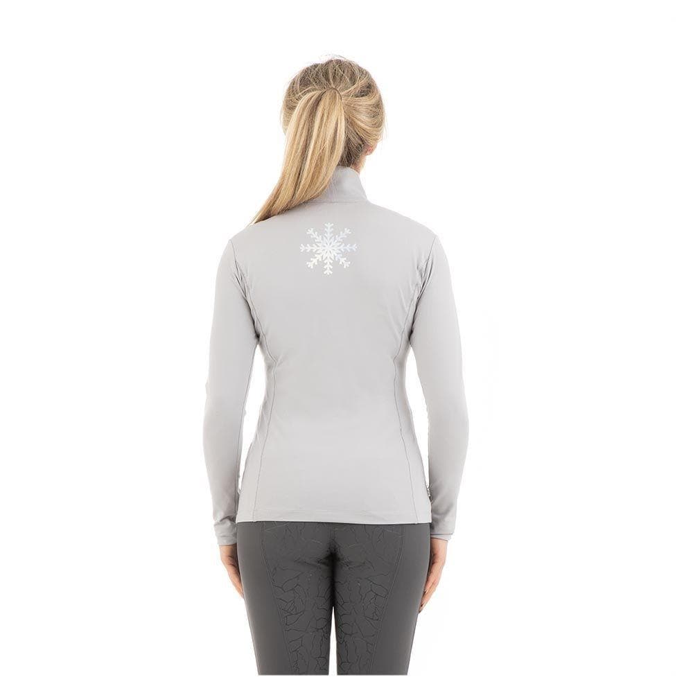Woman wearing ANKY long-sleeved grey top with snowflake design.