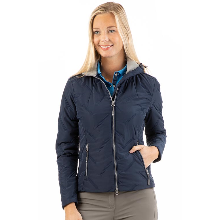 Woman wearing ANKY navy quilted zip-up jacket with hood.