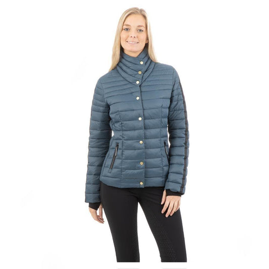 Woman modeling ANKY blue quilted button-up jacket with collar.