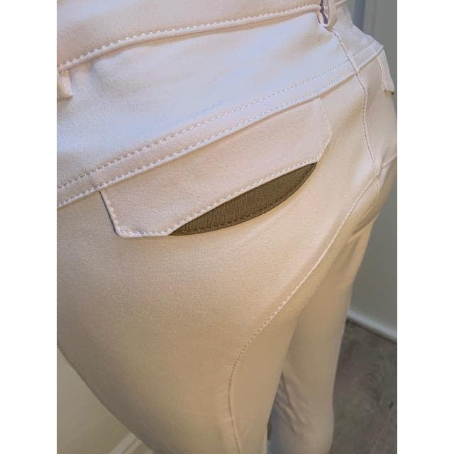 Alt text: Close-up of beige Anna Scarpati riding breeches with pocket detail.