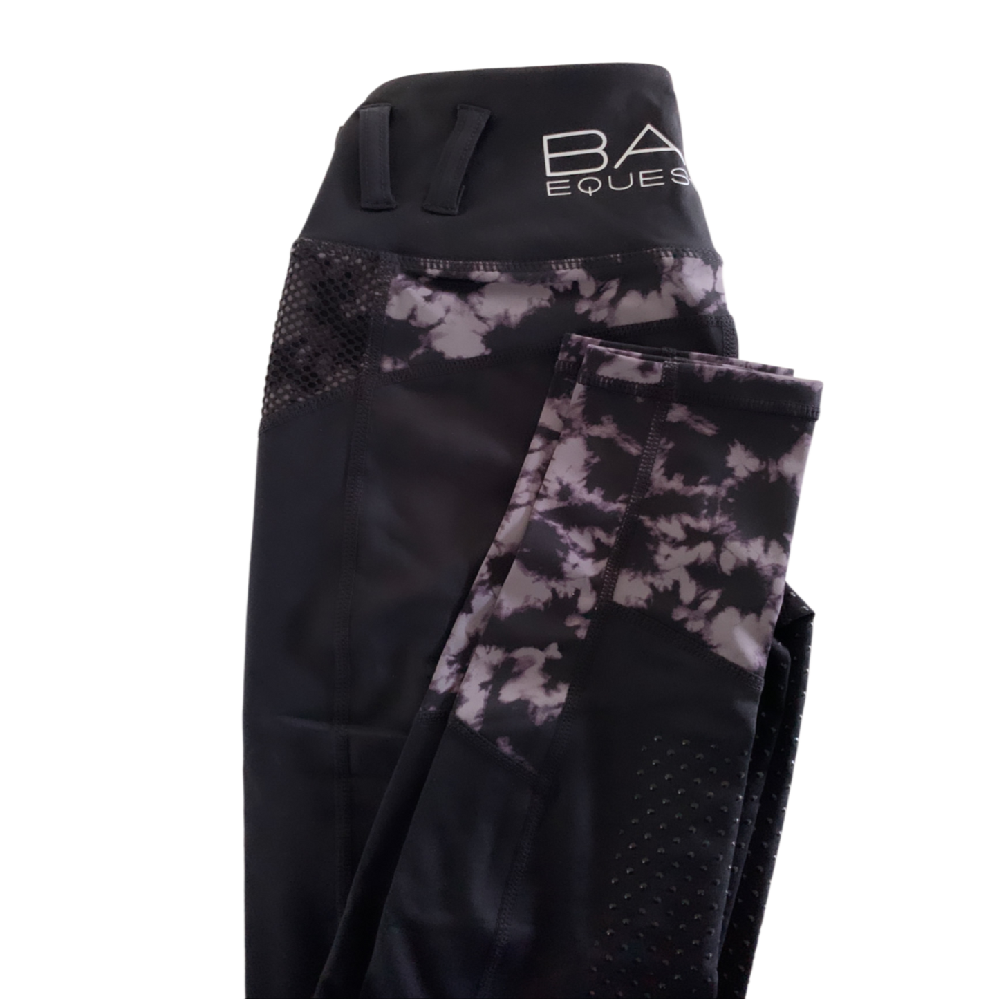 Black horse riding tights with mesh panels and camo accents.