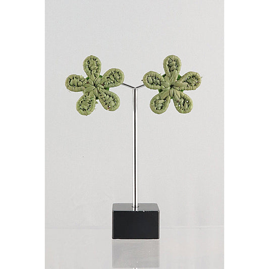 Two green floral metal sculptures.
