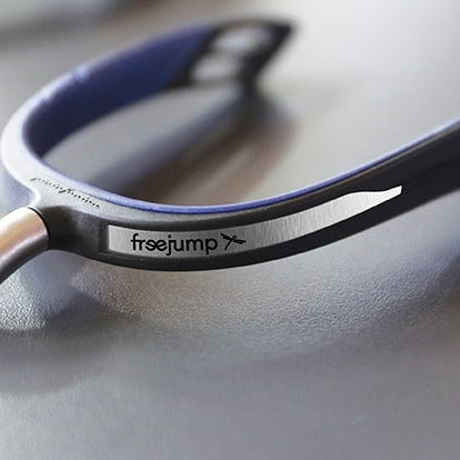 Close-up of Freejump horse riding stirrups with brand logo.
