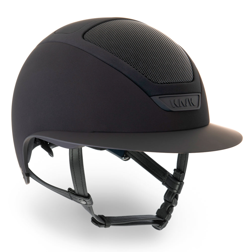 KASK brand equestrian helmet, black with visor and ventilation grid.
