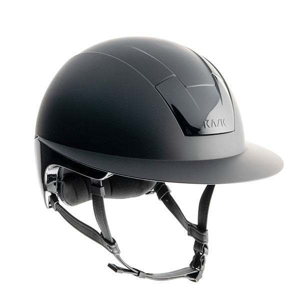 KASK brand horse riding helmet in black with secure chin strap.