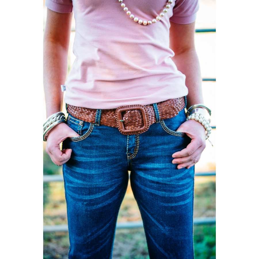 Person in jeans with belt.