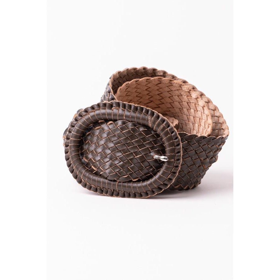 Two woven brown baskets nested.