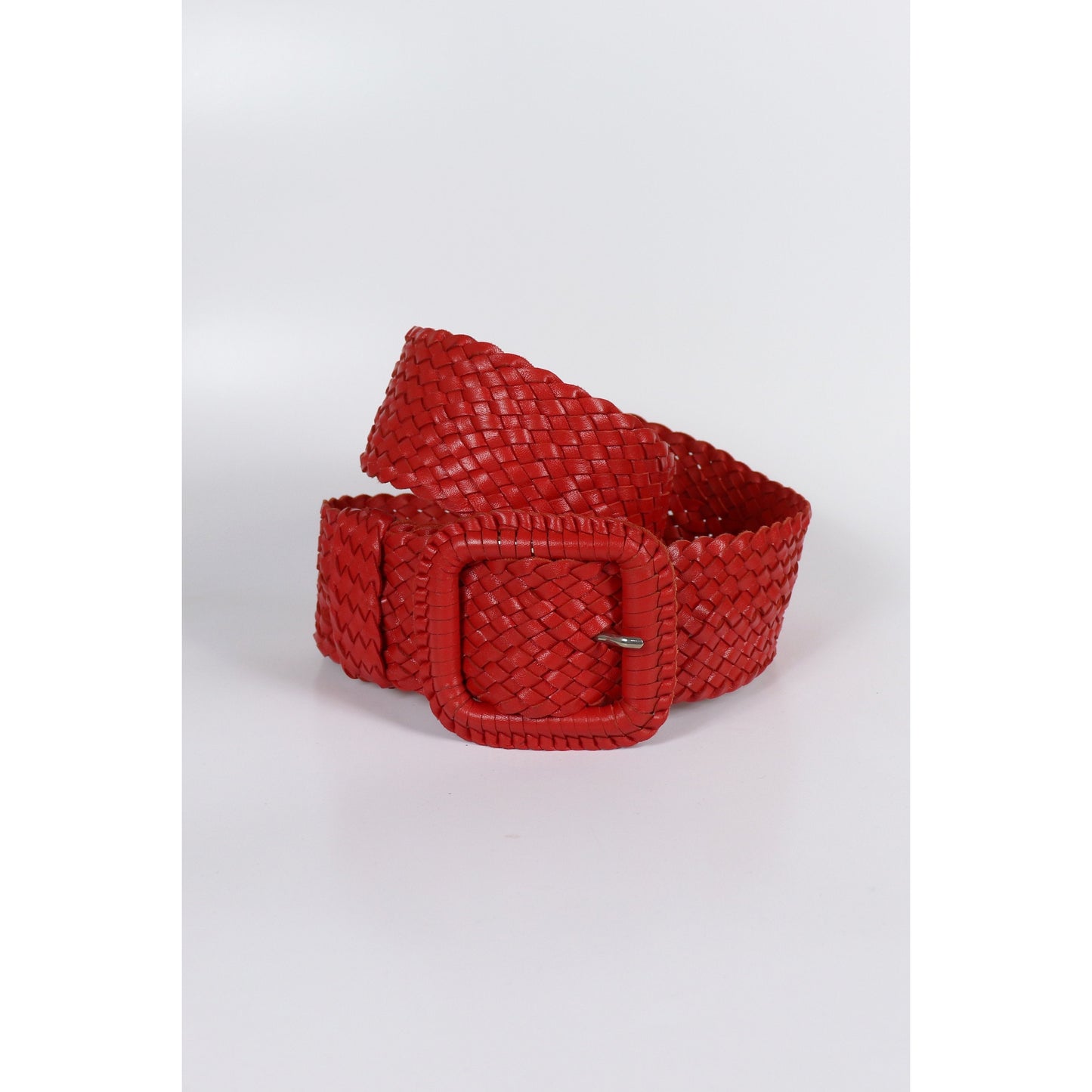 Red woven belt on white