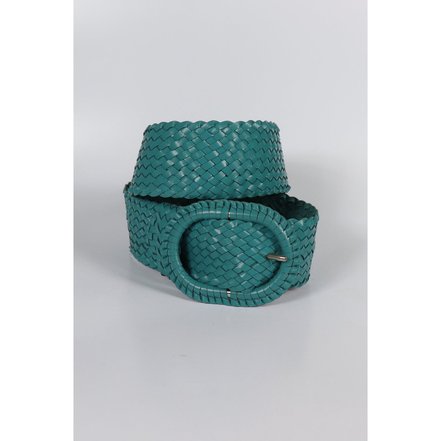 Turquoise woven belt on white.