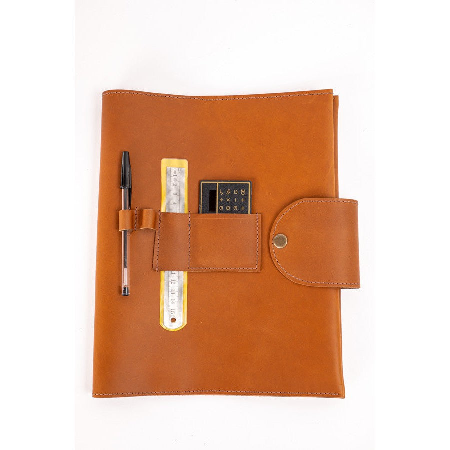Leather organizer with pen, accessories.