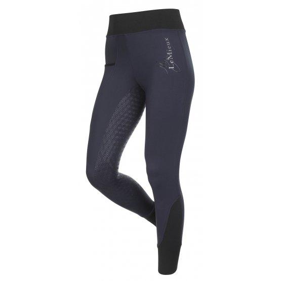 Navy blue horse riding tights with grip pattern on the leg.