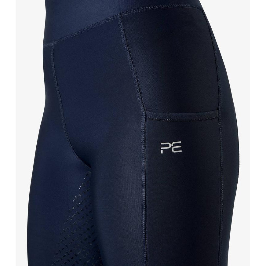 Close-up of navy blue horse riding tights with side pocket detail.