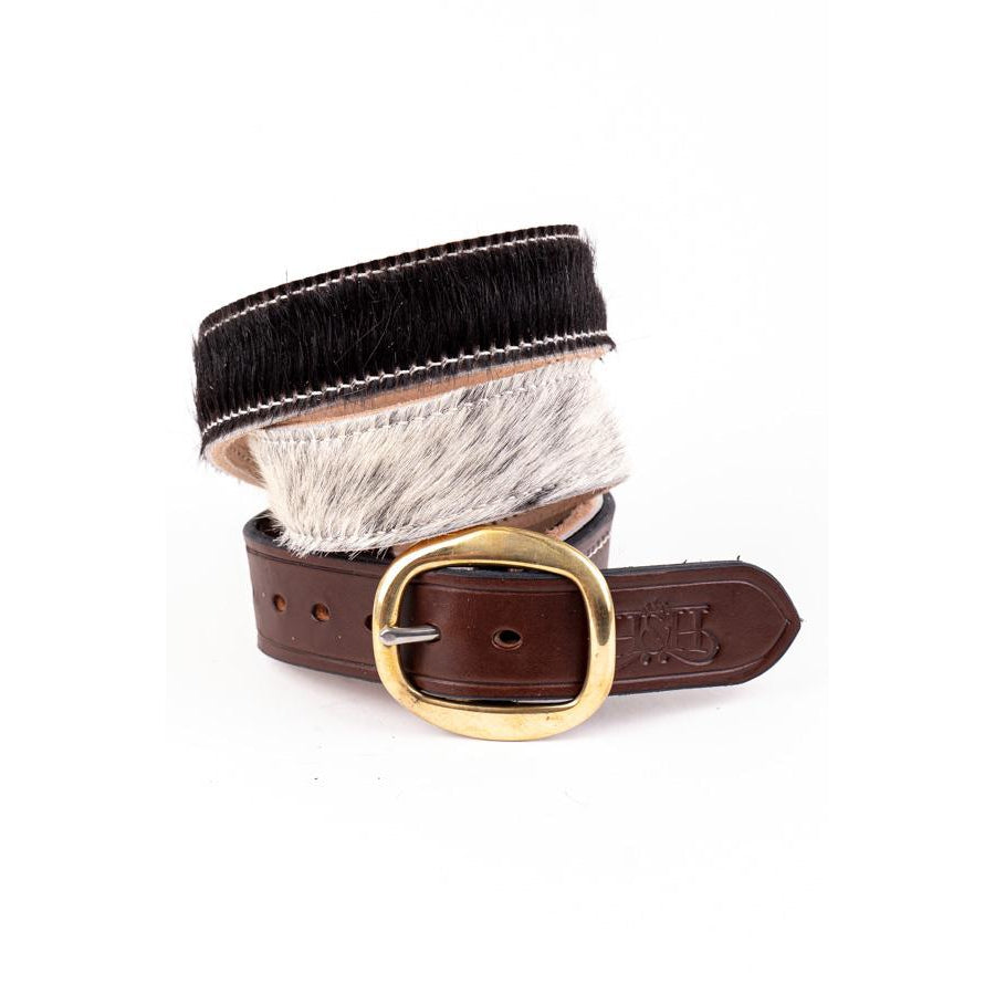 Fur trimmed leather belt isolated.