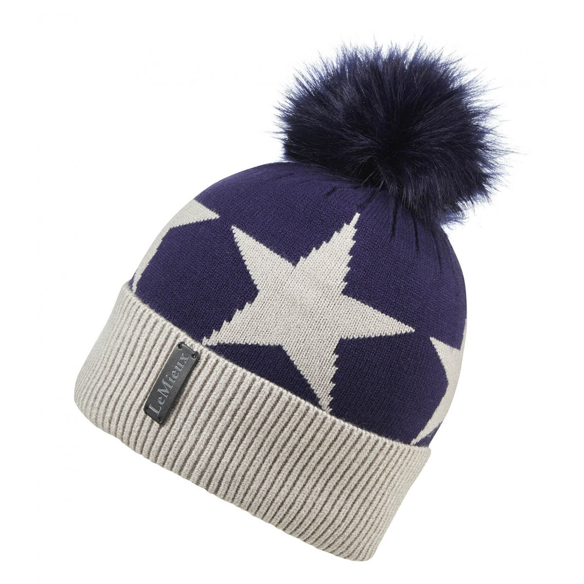 Navy and cream Lemieux beanie with a large star pattern and fluffy pom-pom, branded tag on the ribbed cuff.
