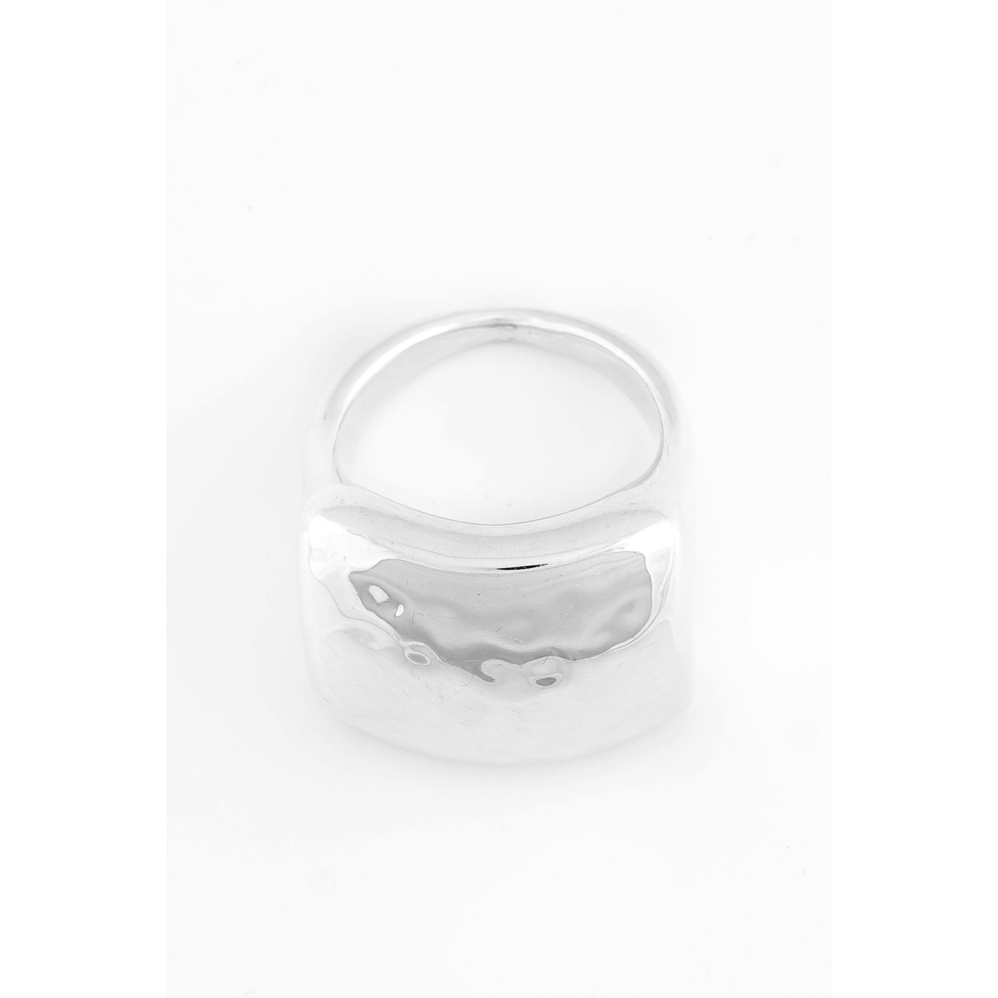 Silver ring on white background.