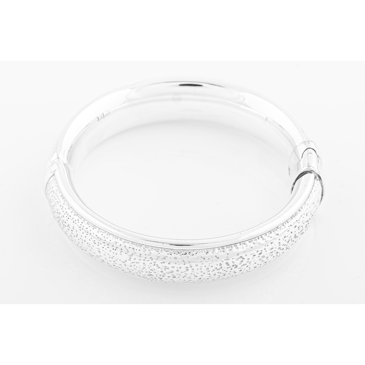 Silver bracelet on white background.