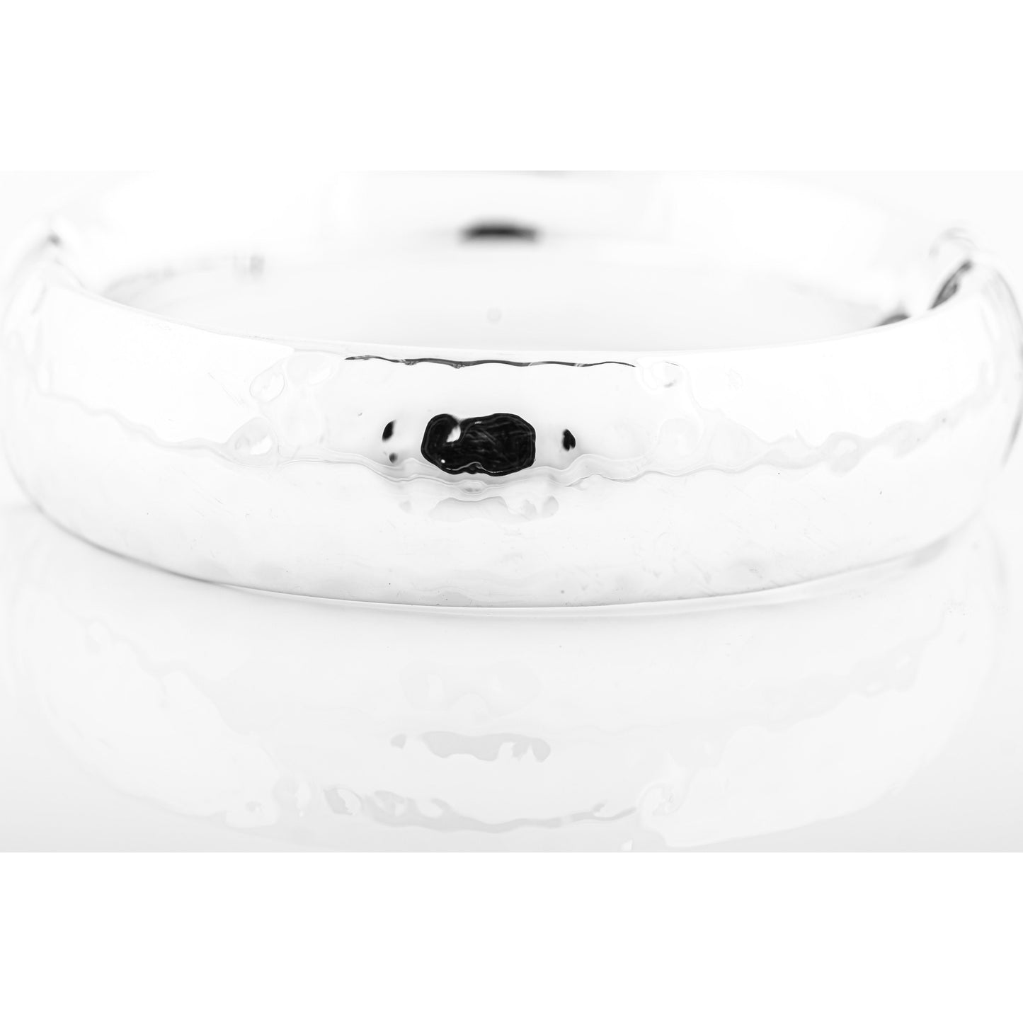 White bracelet on white background.
