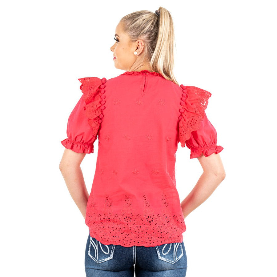 Woman wearing red blouse backwards.