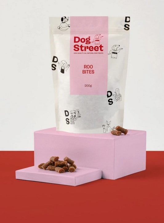 Dog Street Roo Bites kangaroo dog treats packaging on display stand.