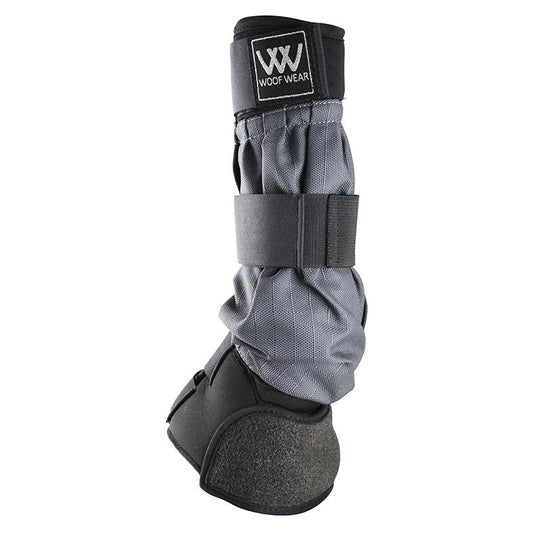 Protective horse boot by Woof Wear with adjustable Velcro straps and reinforced lower section, isolated on a white background.