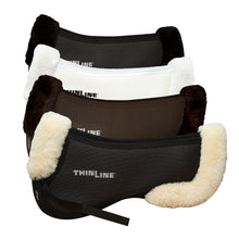 Four Thinline saddle pads in black, white, brown, and black.