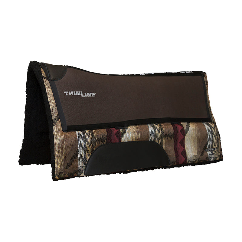 Thinline horse saddle pad with patterned fabric and black accents.