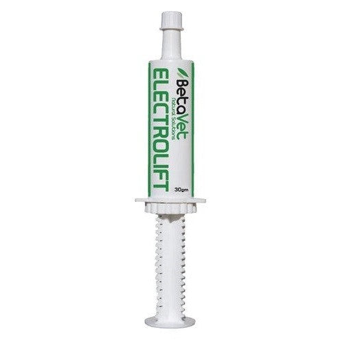 White syringe labeled "Betavet Electrolytes Electrolift" with green accents.