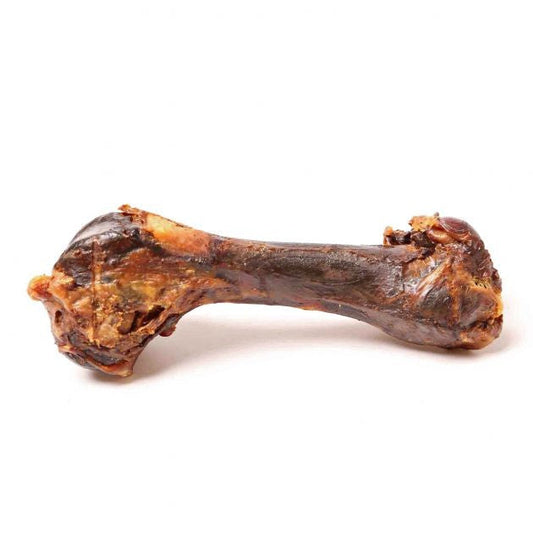 Chewed Blackdog brand dog bone isolated on a white background.