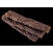 Dried kangaroo dog treats on a black background.