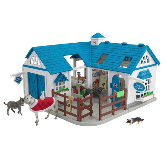 Breyer Horse Toys stable playset with horses, dog, and accessories.