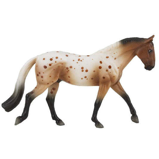 Breyer Horse Toys model, appaloosa pattern, isolated on white background.