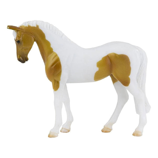 Breyer Horse Toys model of a white and palomino horse figurine.