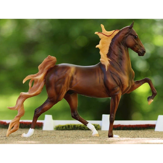 Breyer Horse Toy prancing gracefully with detailed brown coat.