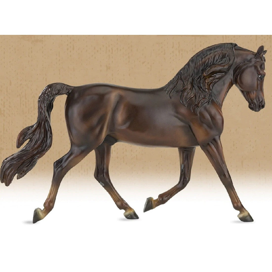 Breyer Horse Toys brown model horse with detailed mane and tail.