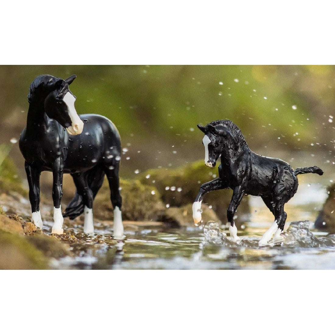 Two Breyer Horse Toys by water displaying dynamic and stationary poses.