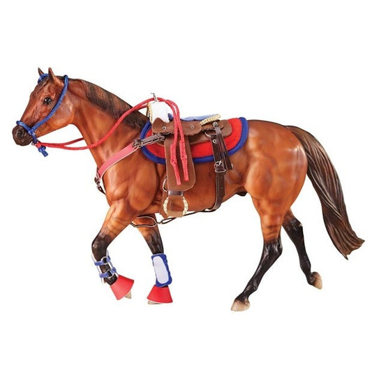 A Breyer Horse Toy with detailed tack and vibrant accessories.